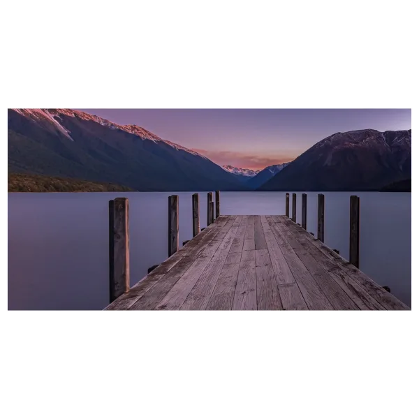 Sunset over the jetty at Lake Rotoiti, St Arnaud, long exposure creating a smooth water effect.