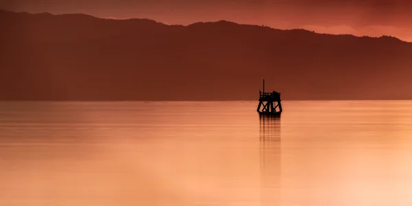 Thames Harbour – Long Exposure Sunset over Firth of Thames with Silhouette Beacon